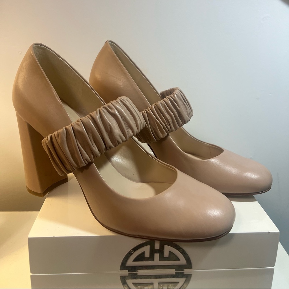 Never Worn Nine West Nude Heels with Decorative elastic band.